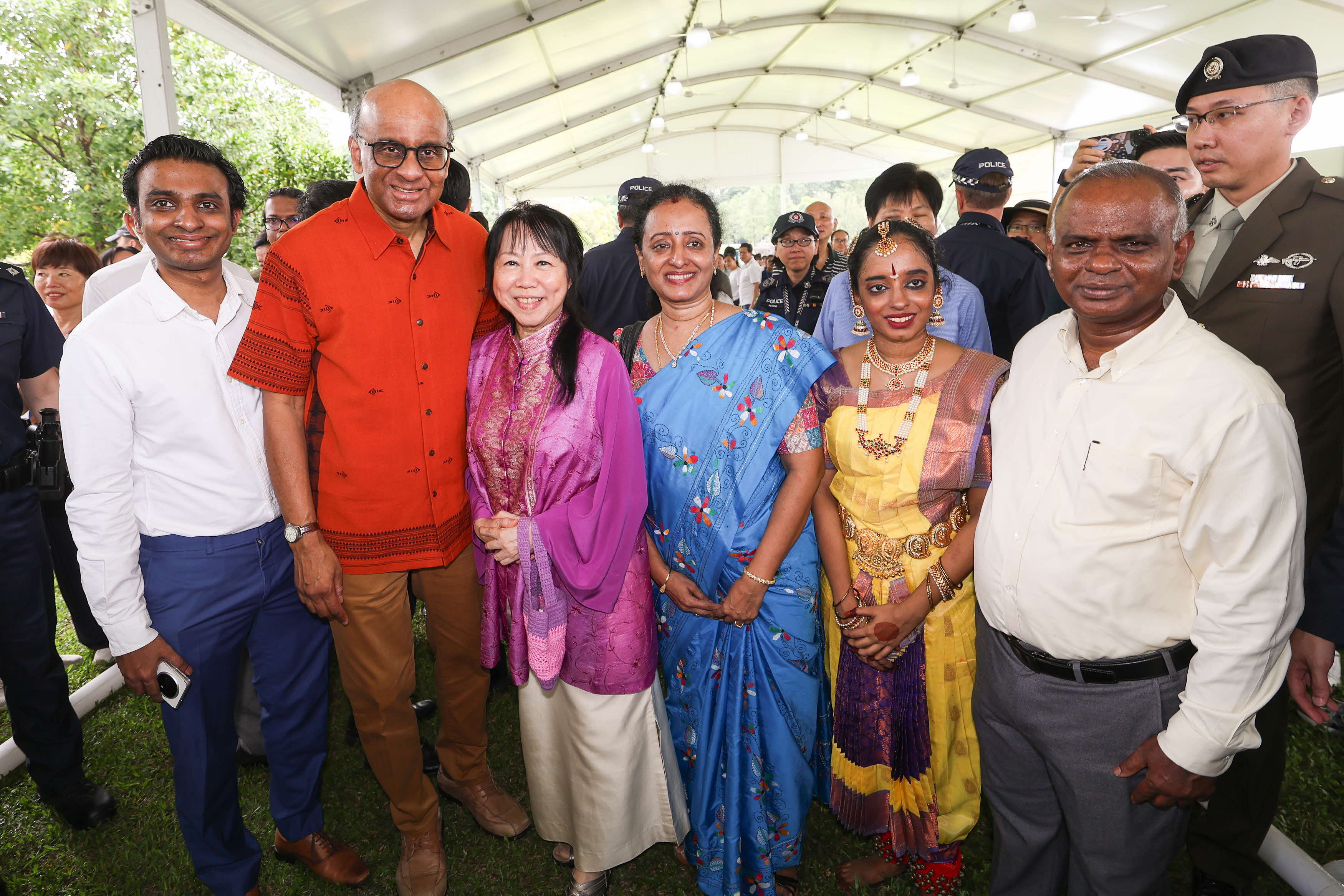 Mr and Mrs Tharman group photo with performers and visitors.